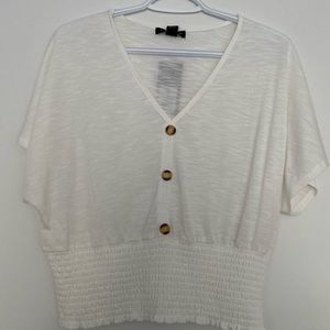 Cute white v-neck with cinched waist